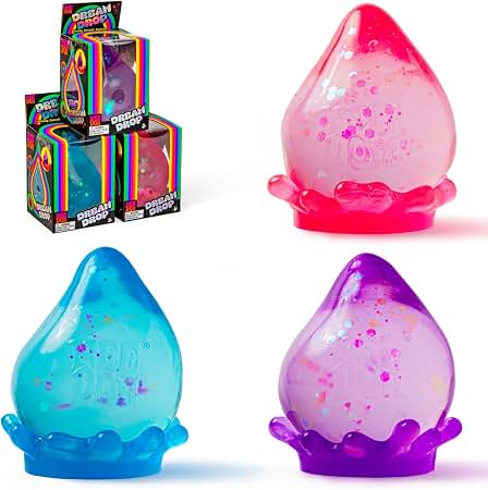 Four Dream Drop surprise toy capsules in pink, blue, purple, and orange, shown alongside their colorful retail packaging on a white background.