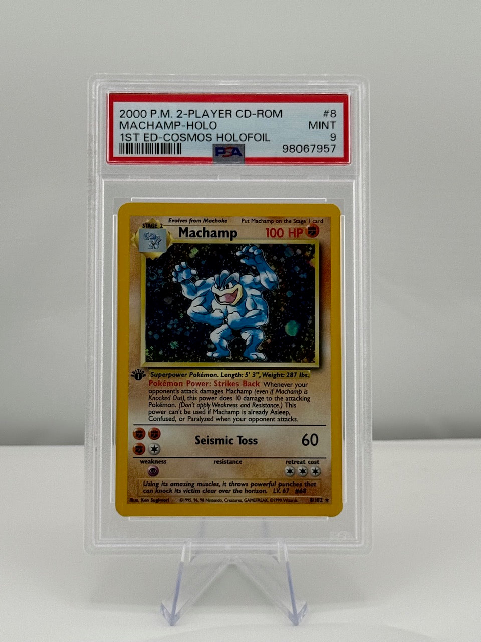 2000 Pokemon Base Set Machamp 8/102 1st Edition Cosmos Holofoil PSA 9 Mint Graded Slab