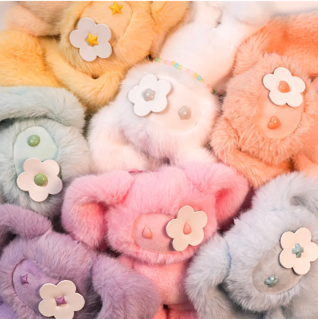 CJ Henry JuJu keychain plush toy, limited edition stuffed animal, soft and collectible, featuring colorful, detailed design.